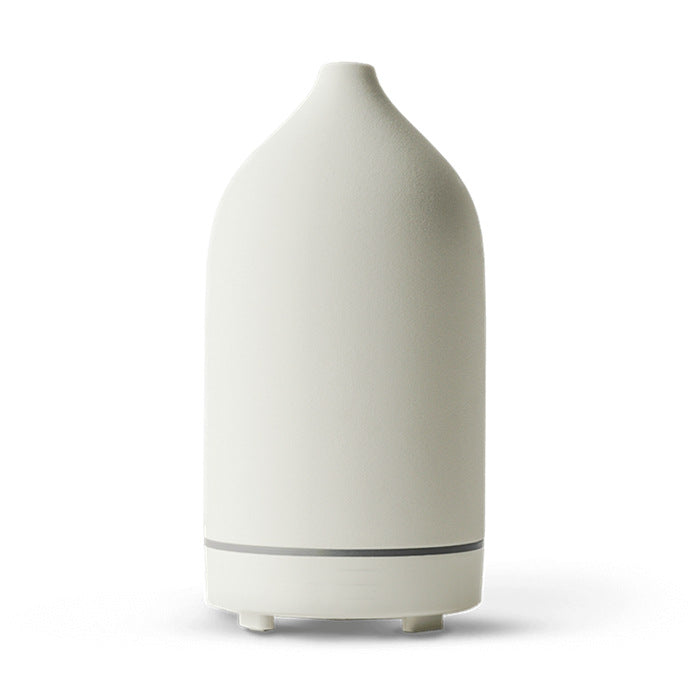 Diffuseur d'huiles essentielles en céramique Nesty - Coloris blanc crème, forme galet lisse