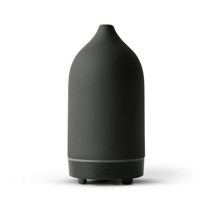 Diffuseur d'huiles essentielles en céramique Nesty - Coloris gris anthracite, forme galet lisse