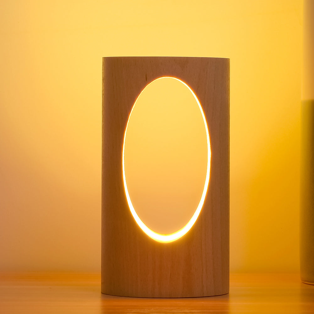 Lampe de lecture LED en bois massif Nesty - Gros plan sur la découpe ovale lumineuse