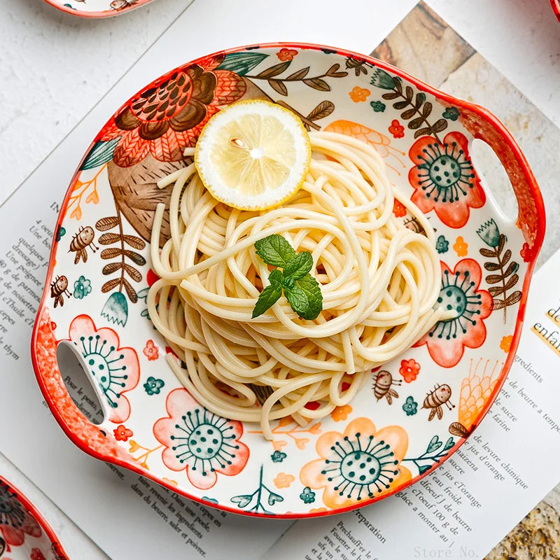 Bol en céramique peint à la main, motif lapin Nesty, plat à poignées à motif floral rempli de spaghettis avec citron et menthe