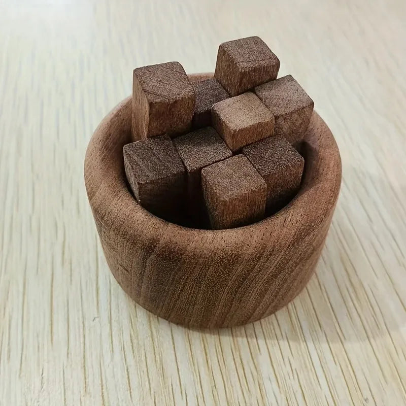 Diffuseur de parfum en bois Nesty - Vue de dessus sur une table en bois