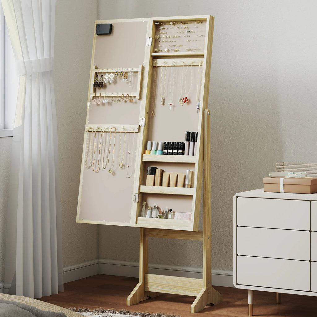 Coiffeuse miroir en bois Nesty - Meuble ouvert avec bijoux et cosmétiques, posé dans chambre près d'une commode blanche