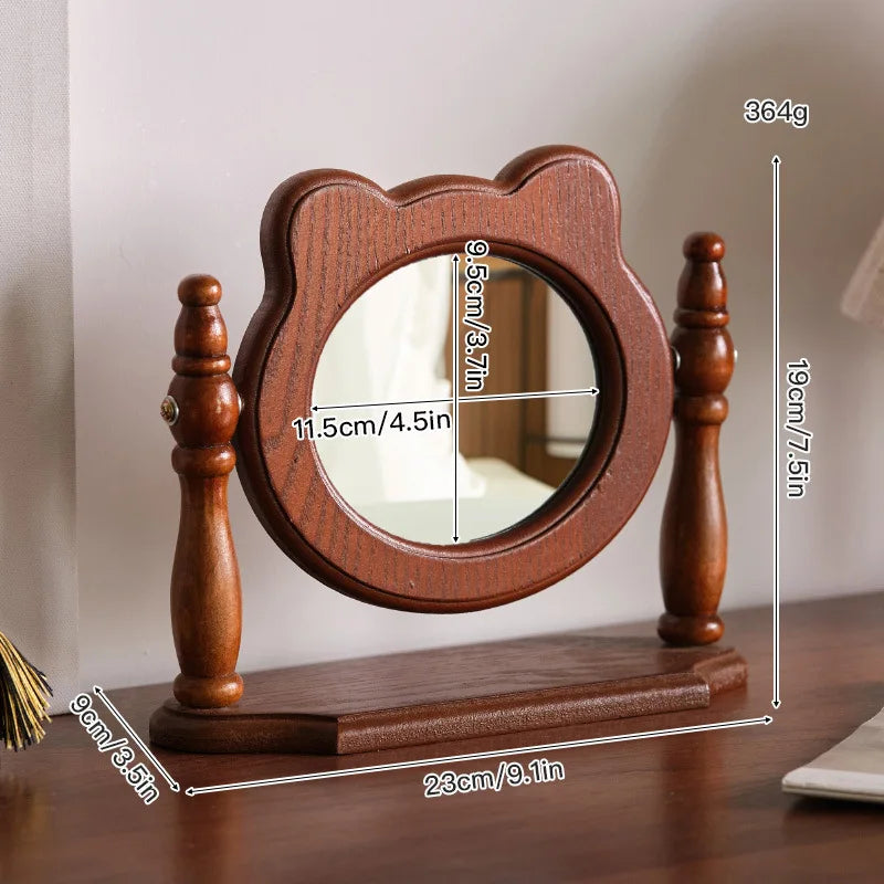 Miroir à poser en bois pivotant forme tête d'ours, avec cotes techniques : 19 cm de haut, 23 cm de large, miroir 11,5 cm, poids 364 g - Nesty
