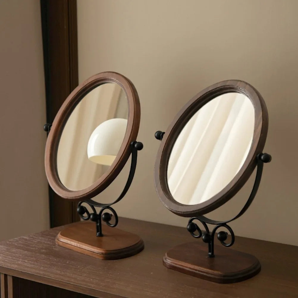 Duo de miroirs à poser ovales en bois pivotant sur pied métal noir enroulé, socle en bois, sur console - Nesty