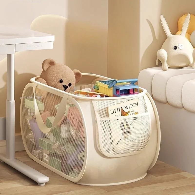 Panier de rangement 2-en-1 pour jouets et linge, grand format Nesty, panier horizontal en tissu filet garni de peluche et jouets, poche à livre Little Witch, chambre d'enfant