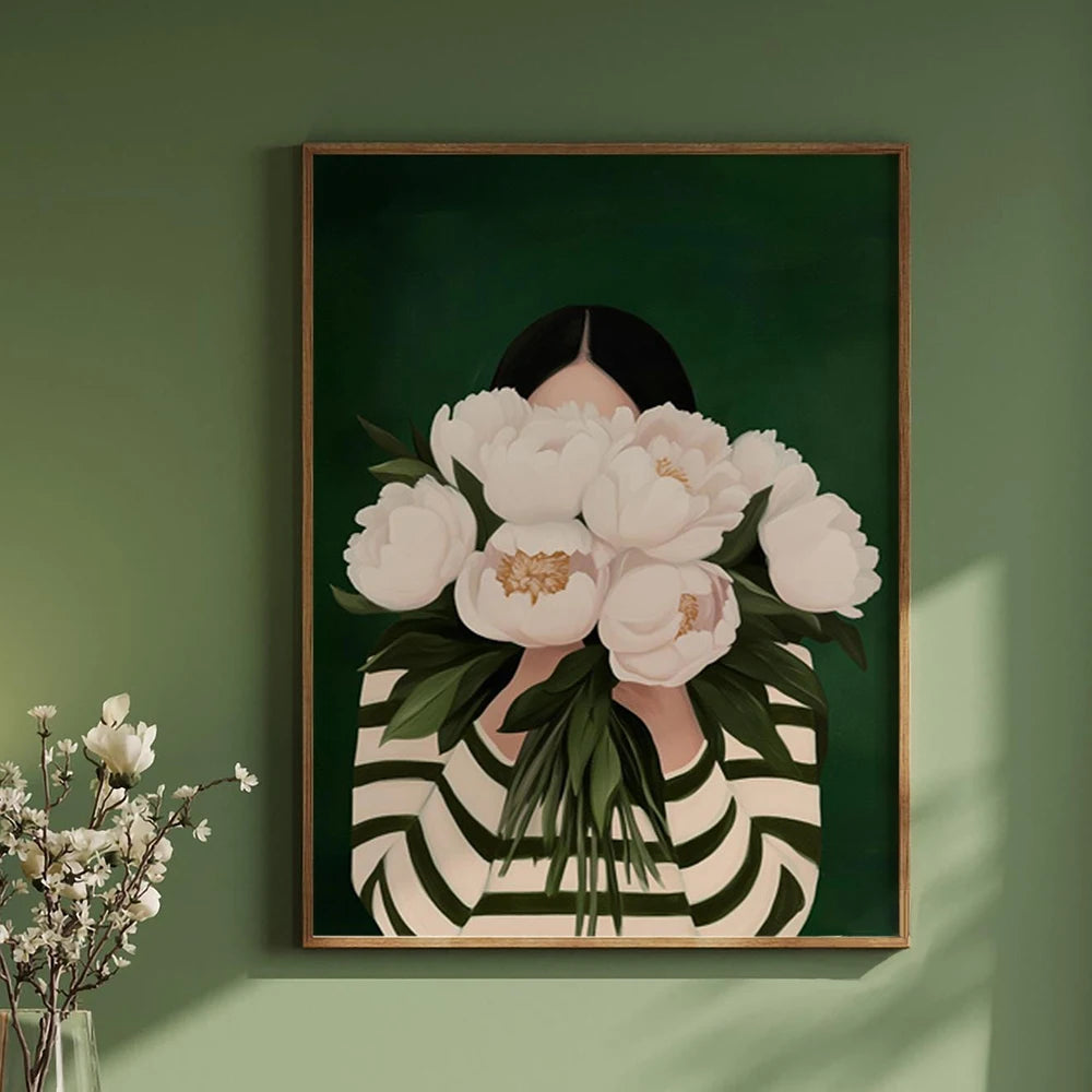 Toile imprimée silhouette abstraite aux fleurs Nesty - Affiche encadrée d'une femme en pull rayé tenant un bouquet de pivoines blanches