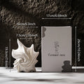 Vase en céramique blanche forme coquillage (vue 7) - Nesty