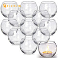 Photophore boule en verre transparent Nesty - Lot de photophores empilés, un exemplaire avec bougie allumée