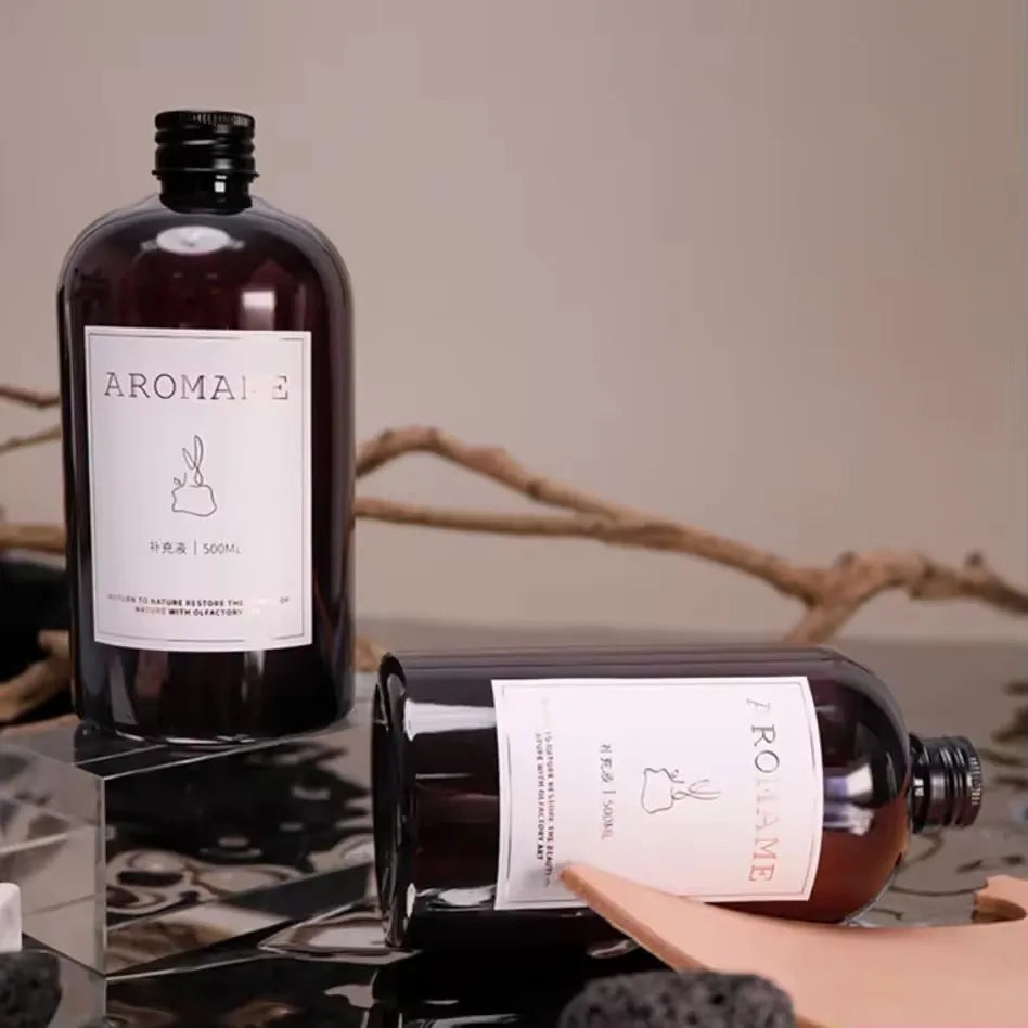 Diffuseur de parfum d'ambiance Nesty - Deux flacons inclinés, décor de branche