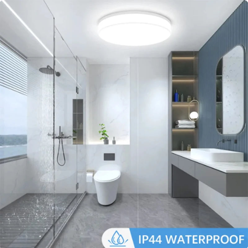 Plafonnier LED ultra-plat rond Nesty - Installé en salle de bain, certifié IP44
