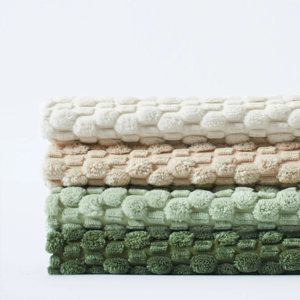 Housse de coussin réversible en velours côtelé Nesty - Empilement replié montrant le tissage