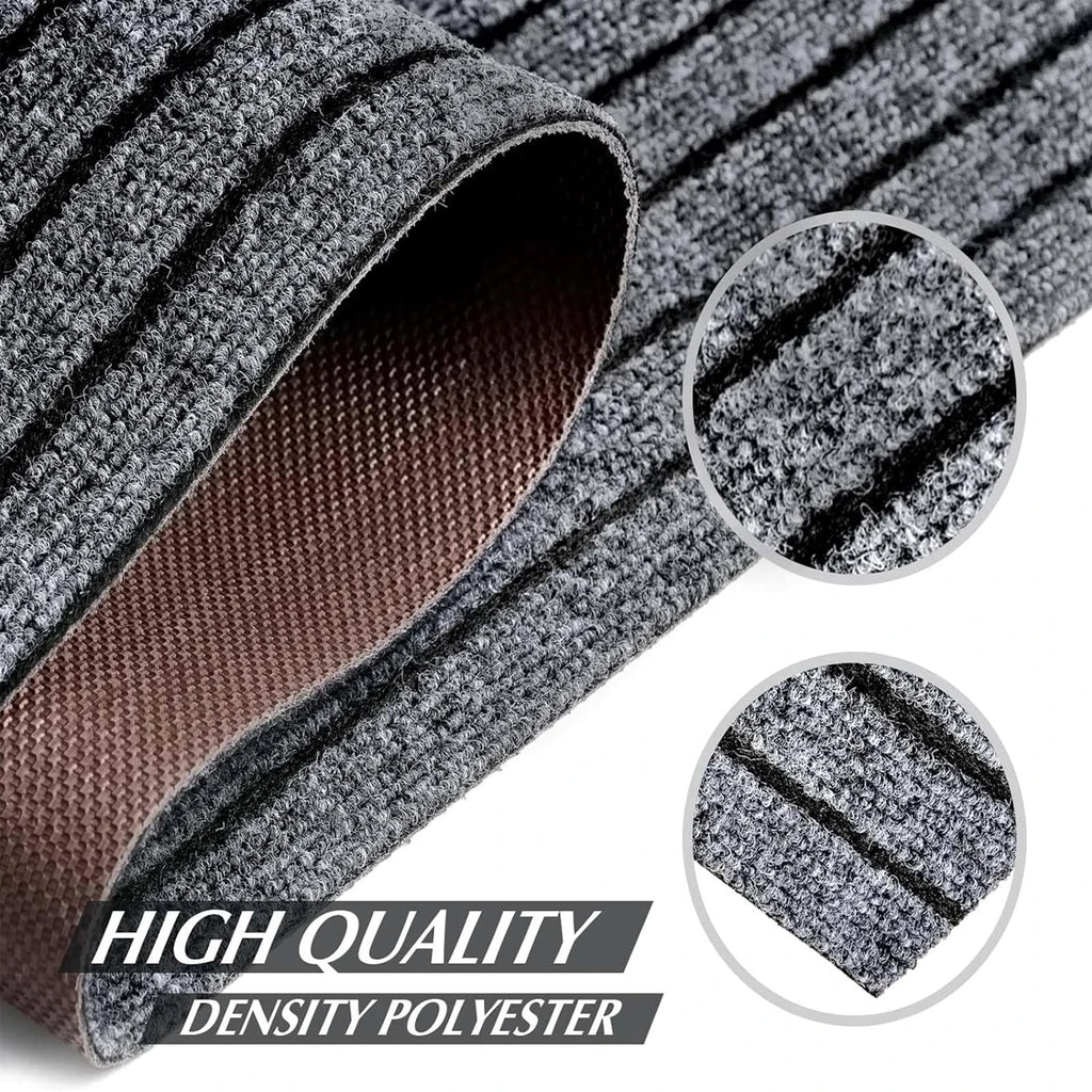 Tapis long à rayures — cuisine et entrée - Nesty, gros plan sur un tapis gris à rayures roulé, envers antidérapant marron, mention haute densité polyester