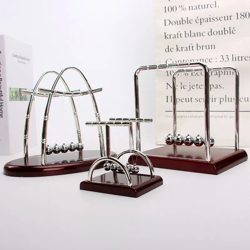 Berceau de Newton Nesty - Trois tailles différentes présentées ensemble
