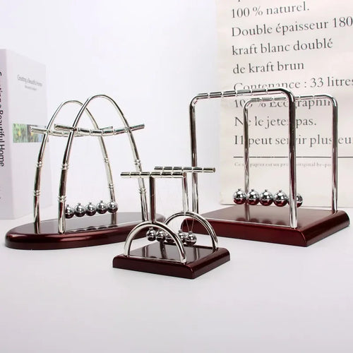 Berceau de Newton Nesty - Trois tailles différentes présentées ensemble