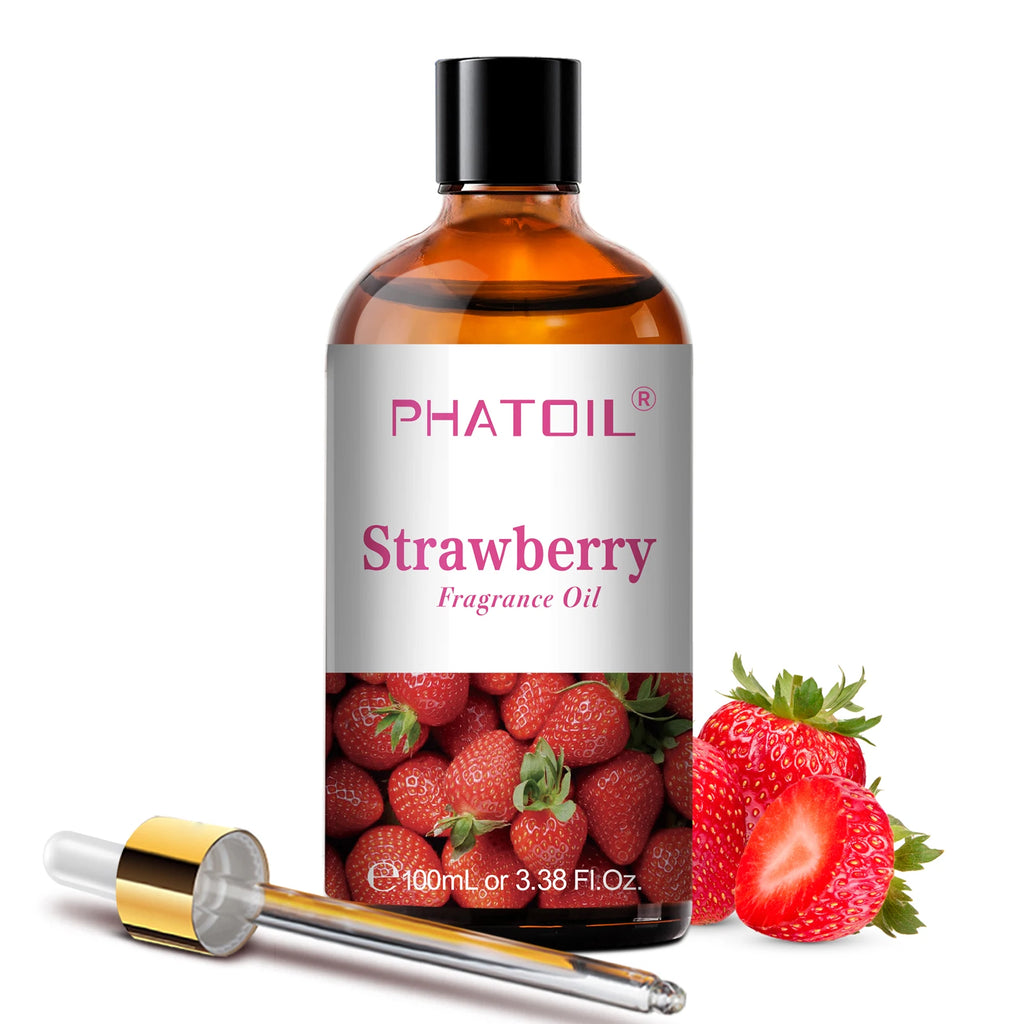 Huile parfumée d'aromathérapie Nesty - Flacon Fraise PHATOIL avec pipette dorée et fraises fraîches