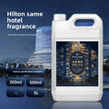 Recharge huile parfumée pour diffuseur Nesty - Bidon 5L blanc parfum d'hôtel cinq étoiles, packshot sur fond nocturne d'immeuble