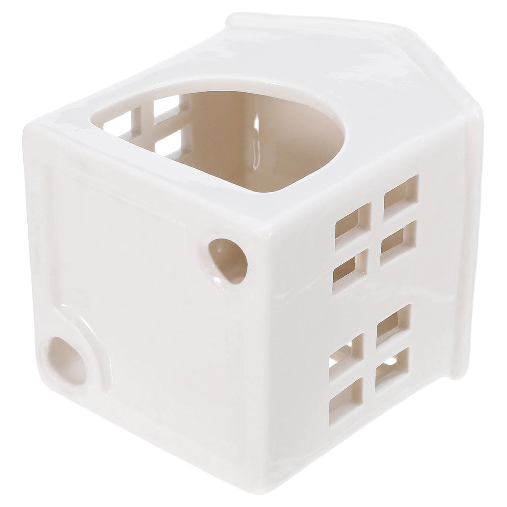 Photophore céramique blanc forme maisonnette cubique, façades ajourées à motif fenêtres, vue de biais - Nesty