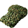 Filet décoratif pour jardin Nesty - Filet camouflage replié sur fond blanc