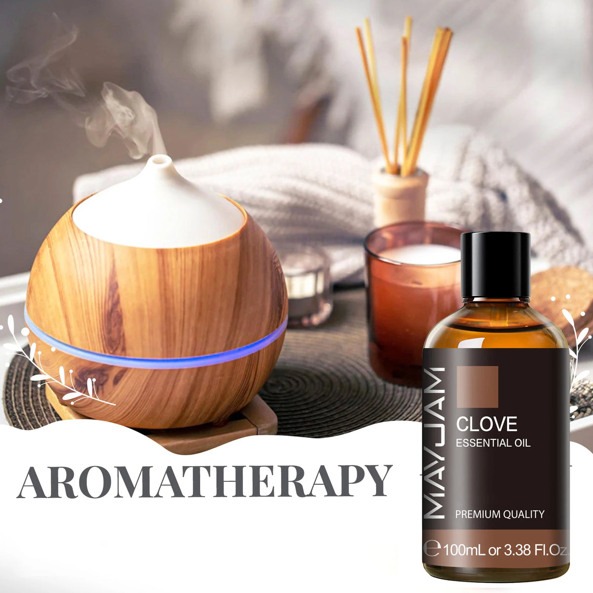 Huile essentielle avec compte-gouttes Nesty - Flacon Clou de girofle MAYJAM près d'un diffuseur en bois et bougie