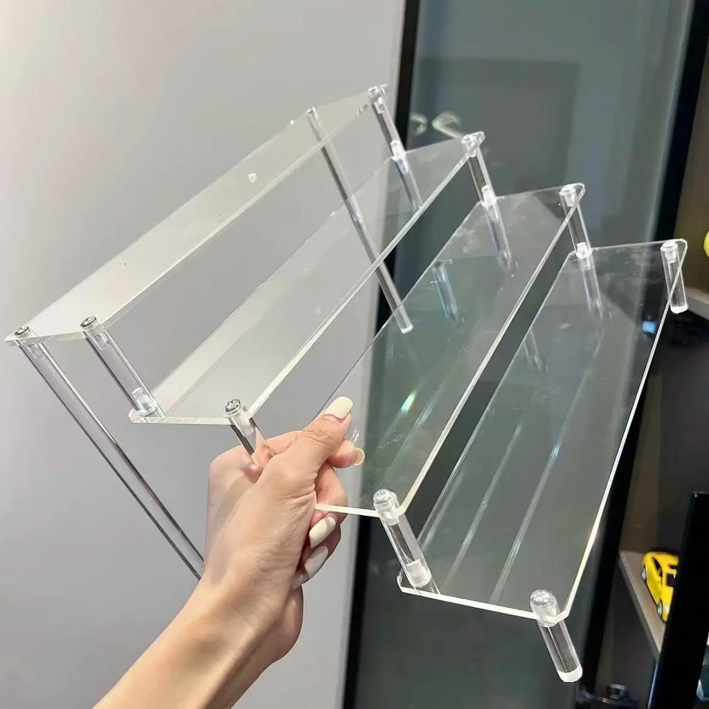 Présentoir étagé en acrylique à 1 à 5 niveaux Nesty, présentoir transparent à 3 niveaux tenu à la main