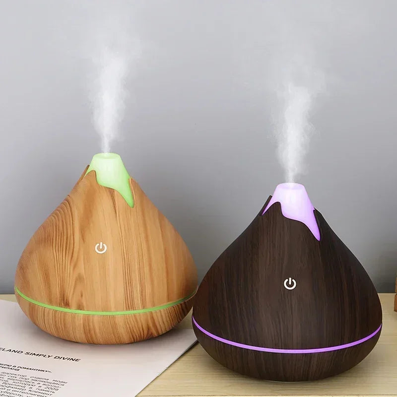 Diffuseur d'huiles essentielles en bois Nesty - Deux coloris bois clair et bois foncé avec brume visible