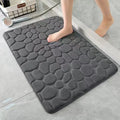 Tapis de bain antidérapant effet galets — relief 3D absorbant - Nesty (vue 1)