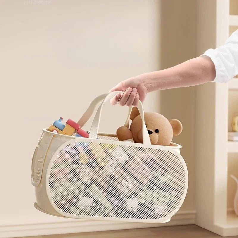 Panier de rangement 2-en-1 pour jouets et linge, grand format Nesty, panier horizontal porté à la main par ses poignées, garni de peluche et de jouets en blocs