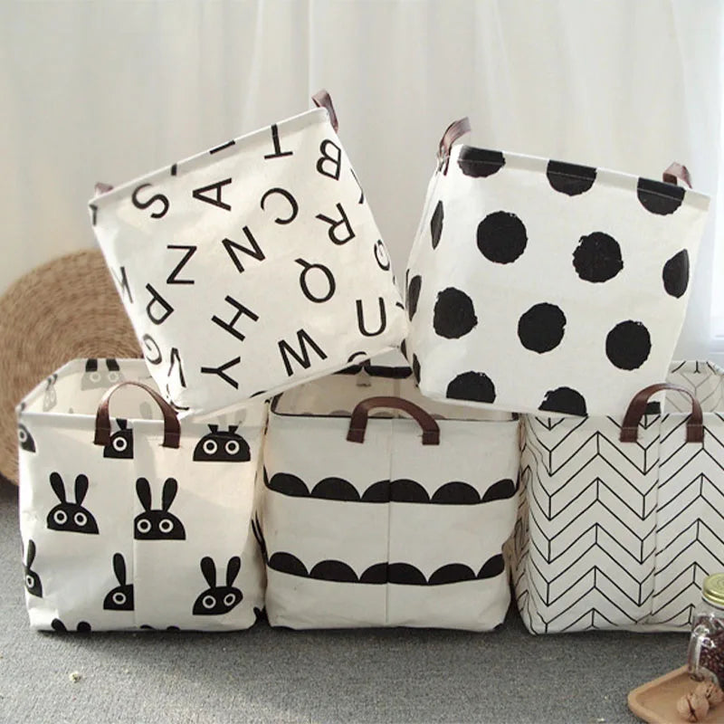 Panier de rangement pliable en lin Nesty - Cinq motifs empilés, alphabet, pois, lapins, vagues et chevrons