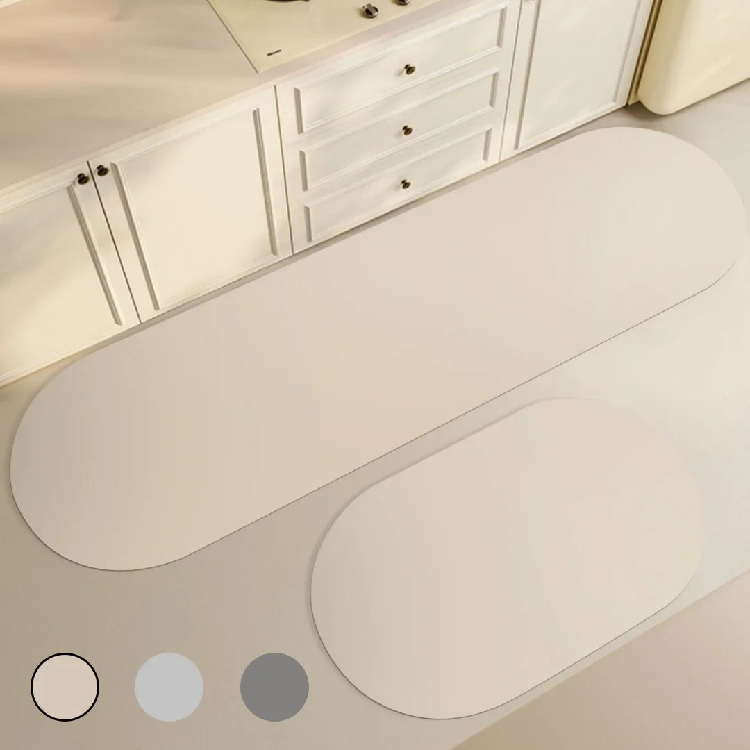Tapis de cuisine long en diatomée Nesty - Antidérapant, forme ovale beige disponible en 3 coloris, posé devant un meuble de cuisine
