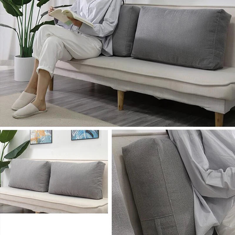 Housse de coussin de dossier en lin, sans garnissage, tête de lit Nesty, homme lisant un livre adossé à deux coussins cale dossier gris sur un canapé-lit, gros plan sur la texture du tissu