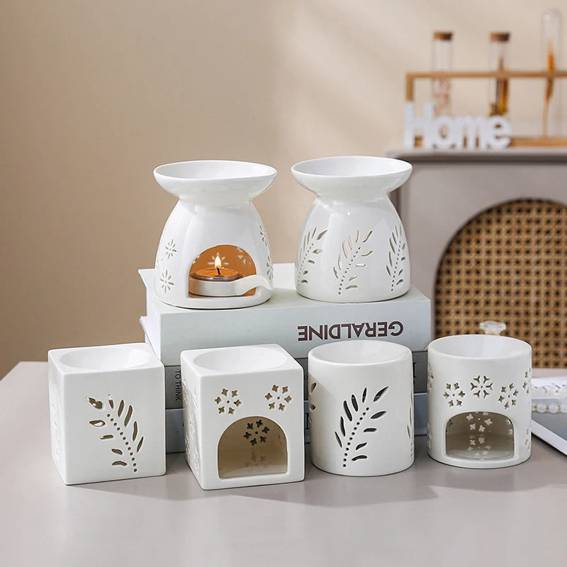 Brûle-parfum en céramique ajourée Nesty - Gamme complète de formes rondes et carrées à motifs variés, sur étagère