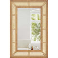 Miroir mural en rotin Nesty - Vue de face sur fond blanc, cadre en cannage rotin et bois, reflet d'une fenêtre avec palmiers