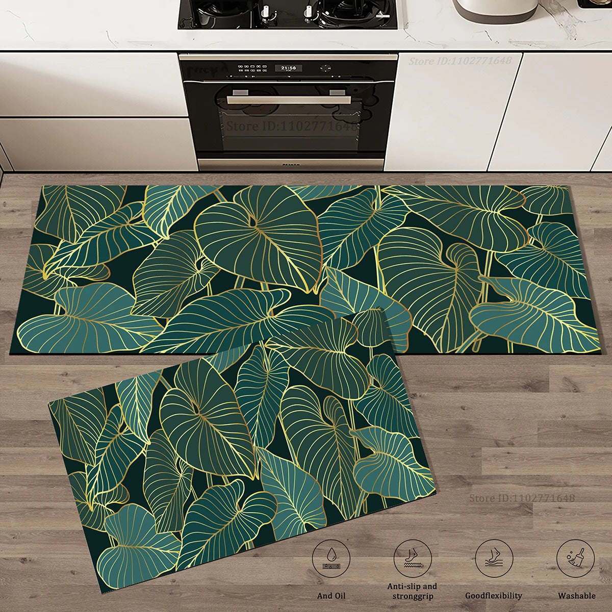 Deux tapis de cuisine assortis à motif de grandes feuilles aux contours dorés sur fond vert foncé, posés devant une cuisinière.