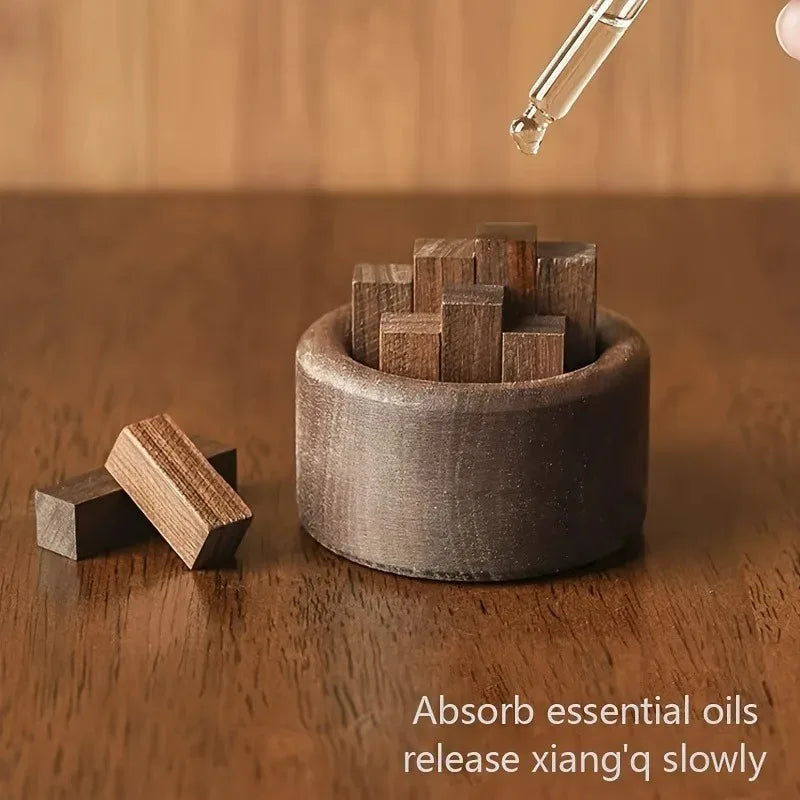 Diffuseur de parfum en bois Nesty - Ajout d'huile essentielle à la pipette