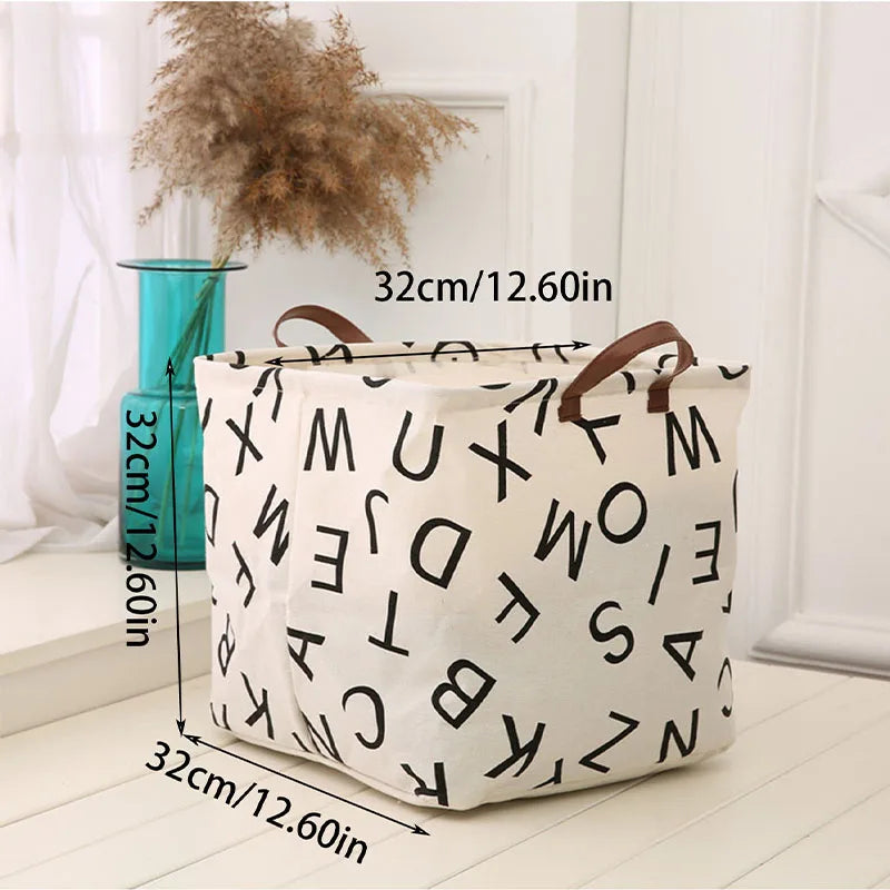 Panier de rangement pliable en lin Nesty - Motif lettres de l'alphabet noires, dimensions 32 x 32 x 32 cm