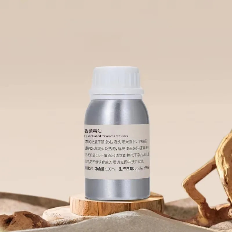 Recharge huile parfumée pour diffuseur Nesty - Flacon argenté 100 ml posé sur billot de bois