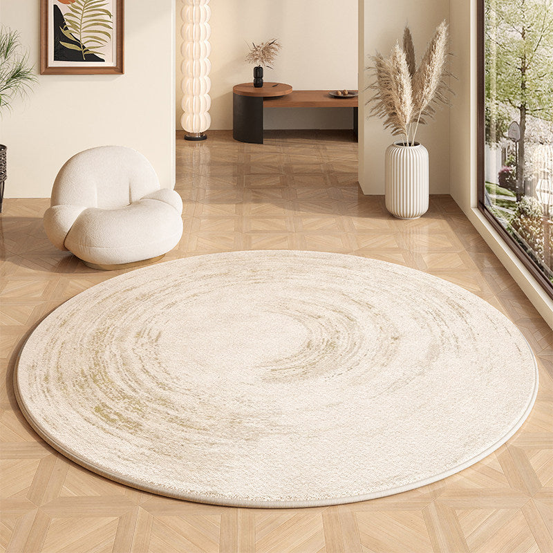 Tapis rond imprimé motif graphique Nesty - Vue en angle montrant le tapis et la baie vitrée